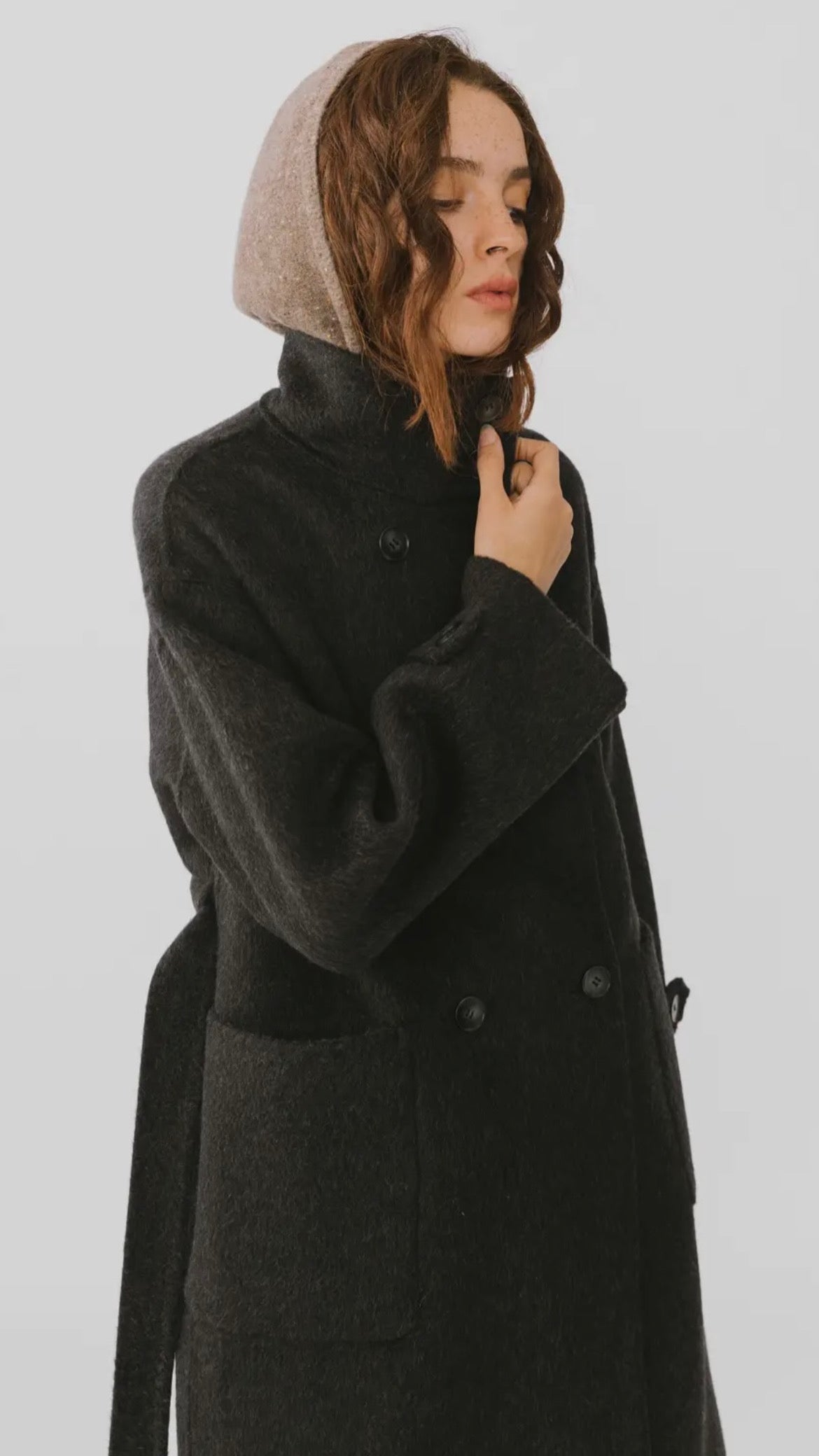 Manteau long à col haut